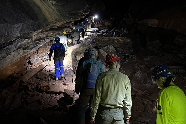 Rangers touring a cave